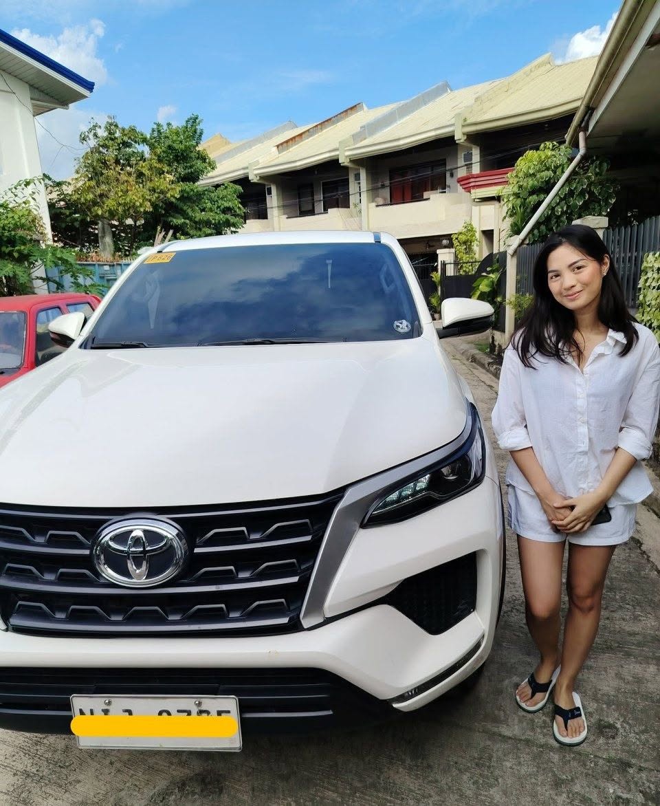 Customer with Toyota Fortuner rental